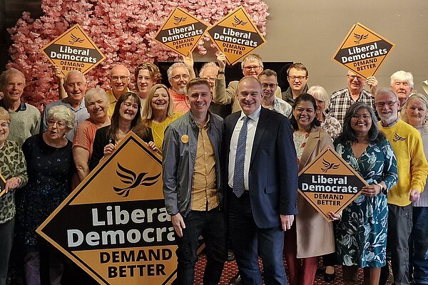 Photo of Stewart Mott and Ed Davey with Liberal Democrat supporters